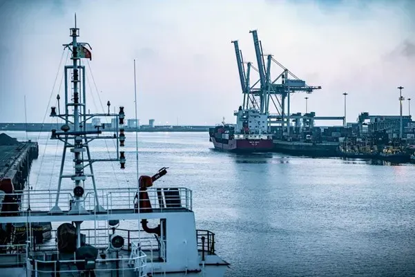 Port cranes viewed from the deck of a vessel