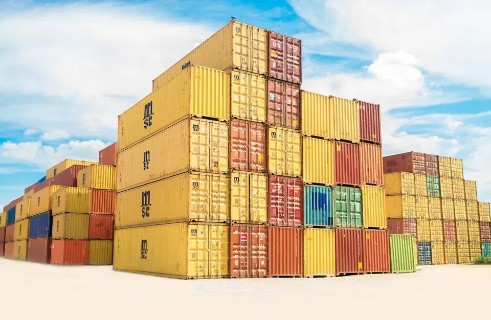 Stacks of shipping containers in a freight yard